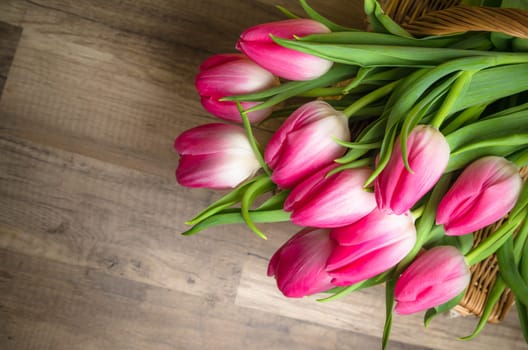 Beautiful bouquet from pink tulips  on a table