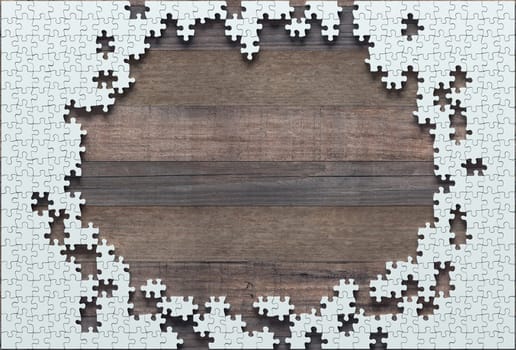 Blank jigsaw puzzle missing half to finish. Concept of work not completed.