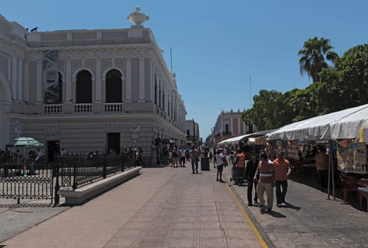 stalls at the street festival in the plaza de la Independencia the merida en domingo merida on sunday.
