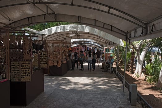 stalls at the street festival in the plaza de la Independencia the merida en domingo merida on sunday.