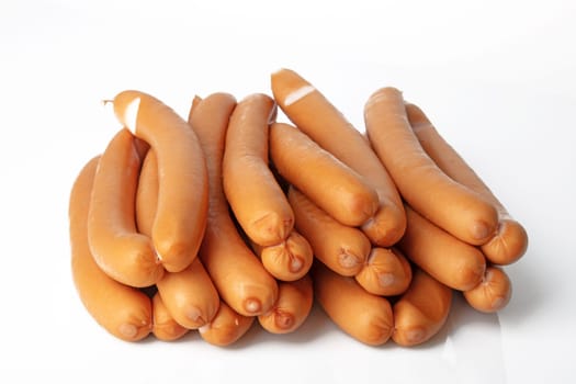 Fresh Frankfurter Sausages on white background
