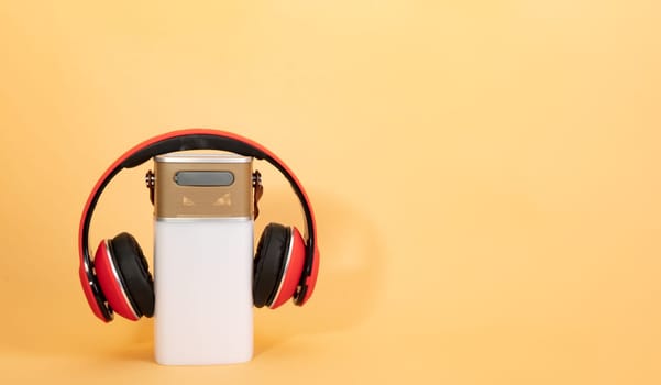 Electronic equipment with Smart Speaker and Headphone on beige Background