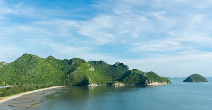 Green Rock or Stone Mountain or Hill and blue sky at Bang Pu Beach Prachuap Khiri Khan Thailand. Landscape or scenery summer season .concept