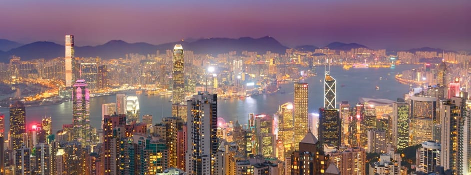 Hong Kong skyline at sunset. View from Victoria peak. Panorama