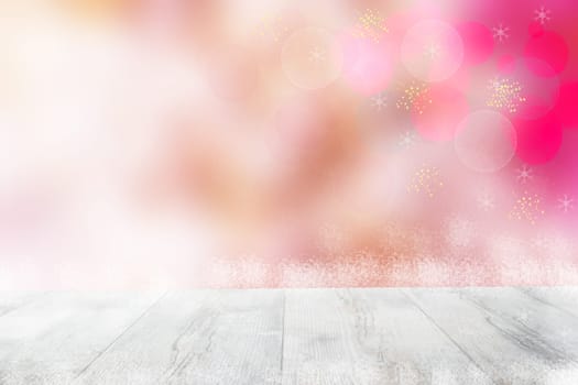 Empty table top or wood floor and blur abstract christmas of background. Empty rustic wooden bright table top in front of abstract light red white christmas winter landscape. Template for your product display montage.