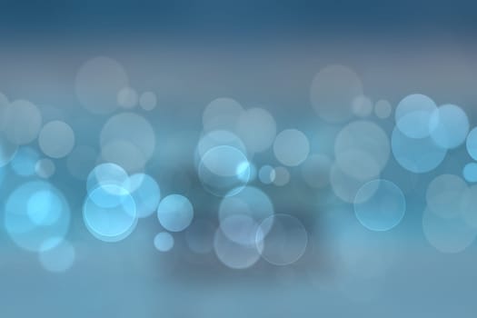 Abstract blue lightening bokeh circles from unterwater bubbles. Beautiful blue texture.