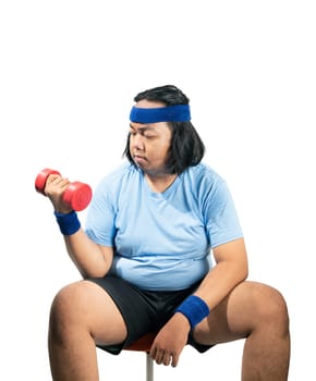 Young asian fat man lose weight using dumbbell isolated over white background. Fat man diet concept