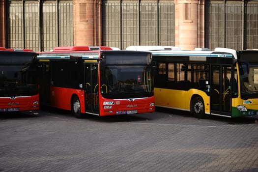 Wiesbaden, Germany - October 07, 2018 Three buses of the Rhine-Main Transport Association stand at the railway station on October 07, 2018 in Wiesbaden..