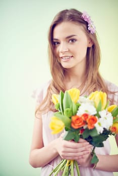 Fragile lady with spring flowers