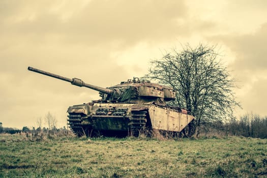 Old tank in autumn nature