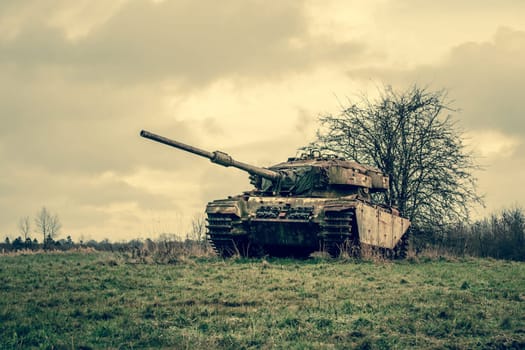 Old tank in autumn nature