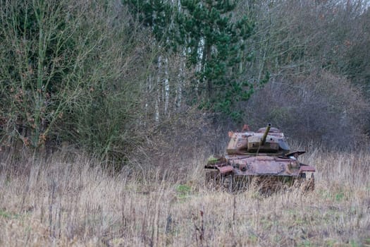 Old tank in autumn nature