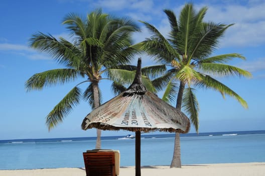 Stand,sun,sea,palm seam. This is how one imagines a tax haven.