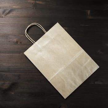 Craft paper bag. Flat lay.