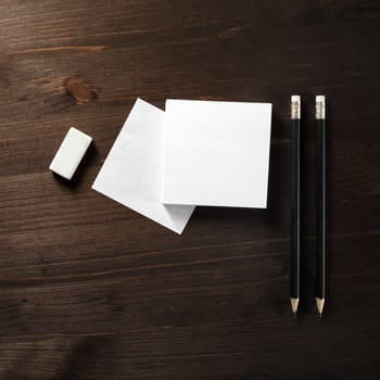 Notes, pencils, eraser. Flat lay.