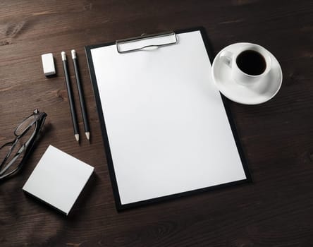 Blank stationery set on wooden background. Branding mock up.