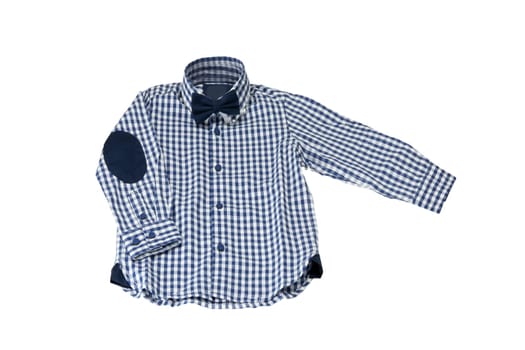 Children clothes. Fashionable blue white checkered kids long-sleeved shirt with a blue bow-tie. Isolated on a white background. Kids fashion.