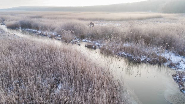 lake in winter. Location: Comana Natural Park, Romania. Aerial view