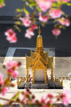 Close up shot of small temple model of buddhist spirit house in Bangkok, Thailand