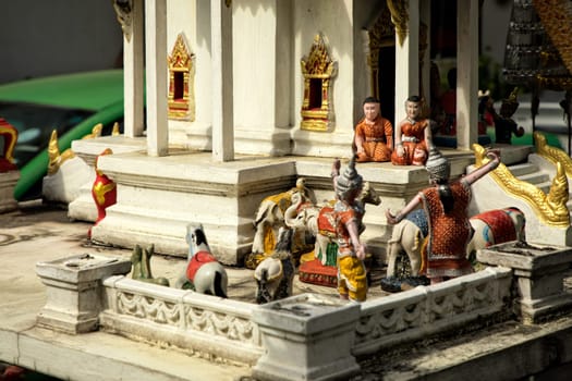 Close up shot of small temple model of buddhist spirit house in Bangkok, Thailand