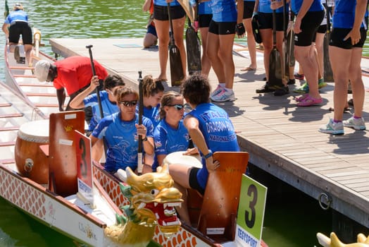 Rome, Italy - July 30, 2016: Dragon boat crews  compete at the european championships held in Italy in 2016 summer, , in the photo the Italian crew