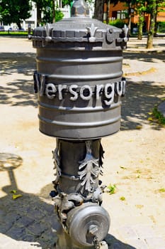Hydrant in Wiesbaden Germany with lettering Versorgung means Care