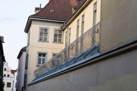 Correctional facility in Lüneburg with barbed wire and guard tower of the prison