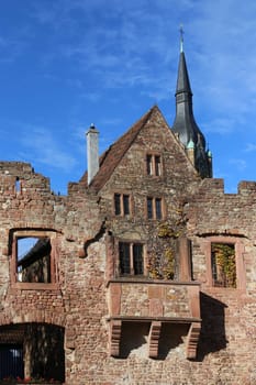 Tiefburg and tower of the Friedenskirche in the Heidelberg district of Handschuhsheim