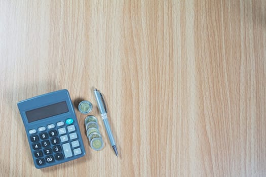 Top view of stock financial indices with stack coin and calculator. Financial stock market in accounting market economy analysis.