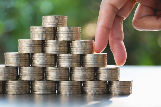 Saving money concept with money coin stack growing for business. financial and accounting concept.
