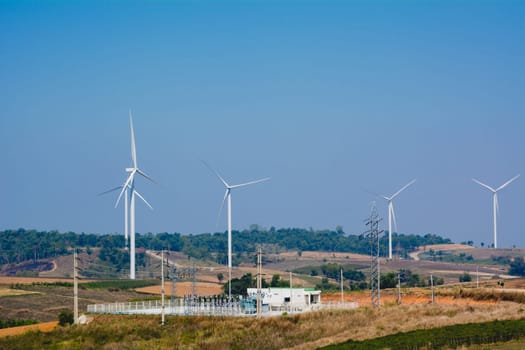 Wind turbines under the blue sky. Wind turbines generating electricity.