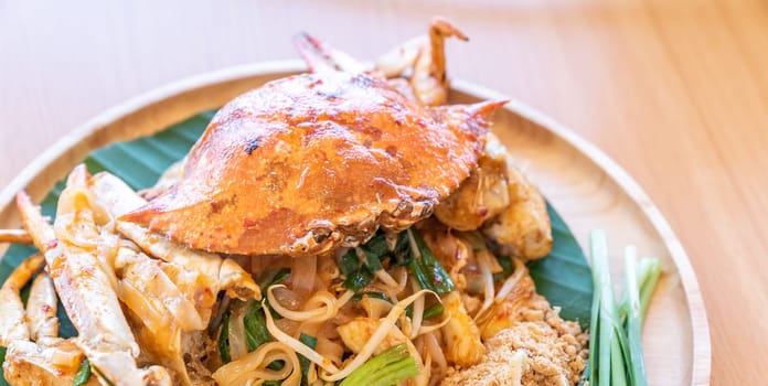Pad thai, stir fried noodle, with blue crab. Thai eastern tradinational food cuisine