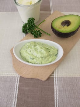 Guacamole with avocado, fresh cheese and parsley