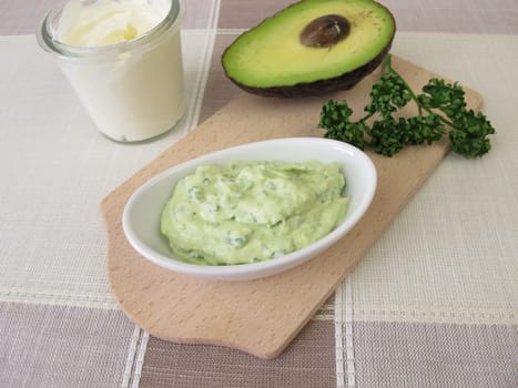 Guacamole with avocado, fresh cheese and parsley