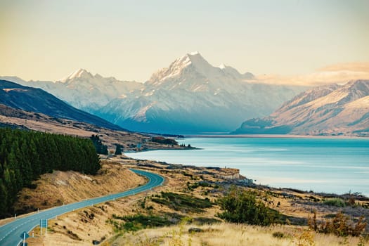 Road to Mt Cook, the highest mountain in New Zealand. Scenic highway drive along Lake Pukaki in Aoraki Mt Cook National Park, South Island of New Zealand.