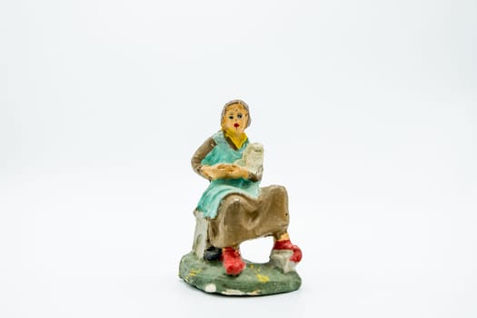 Christian nativity scene figure isolated on white background. Traditional Italian "presepe"" figurines."