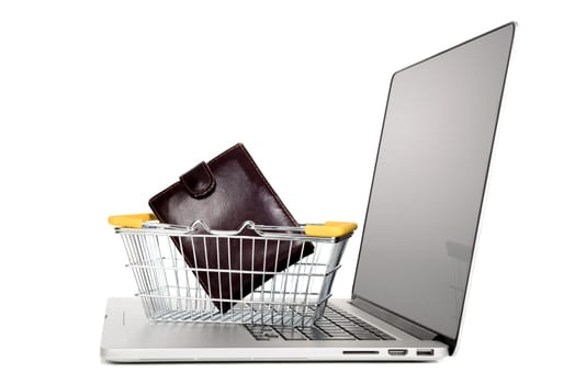Laptop with small shopping basket and wallet isolated in white