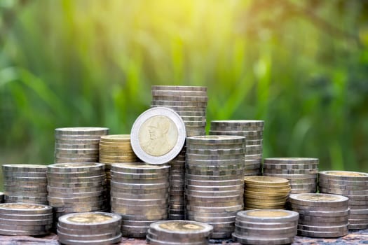 Saving money concept with money coin stack growing for business. financial and accounting concept.