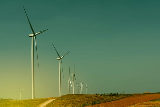 Wind turbines under the sky for technology concept. Wind turbines generating electricity.