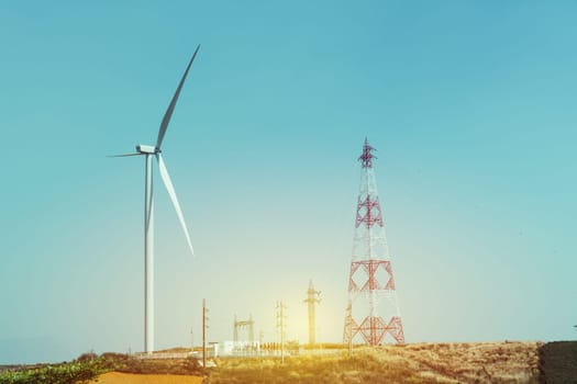 Wind turbines under the sky for technology concept. Wind turbines generating electricity.