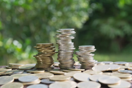 Saving money concept with money coin stack growing for business. financial and accounting concept.