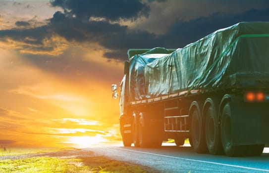 Trailer, trucks on an asphalt road in a rural for transportation concept..