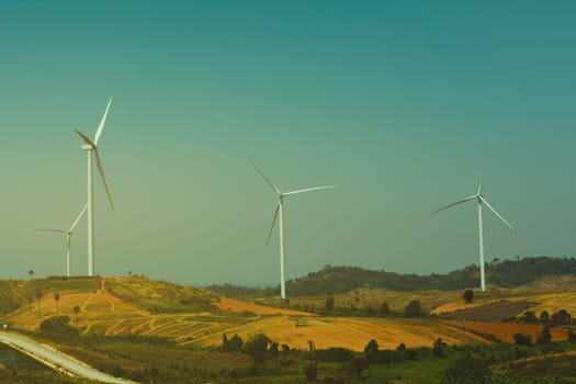 Wind turbines under the sky for technology concept. Wind turbines generating electricity.