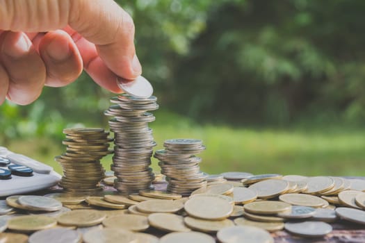 Saving money concept with money coin stack growing for business. financial and accounting concept.