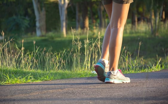 A woman running at the morning for jogging, exercising and healthy lifestyle concept.