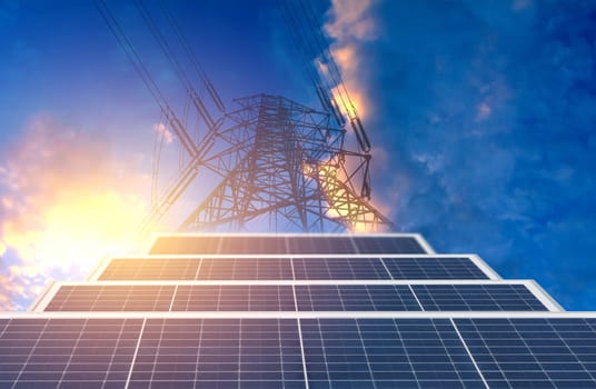 High voltage pole with solar cell on blue sky background for energy and power concept. High voltage tower.