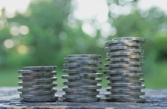 Saving money concept with money coin stack growing for business. financial and accounting concept.
