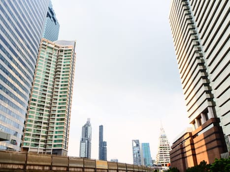 Modern and bottom up view of buildings in Thailand. Economy, finances, business activity concept.