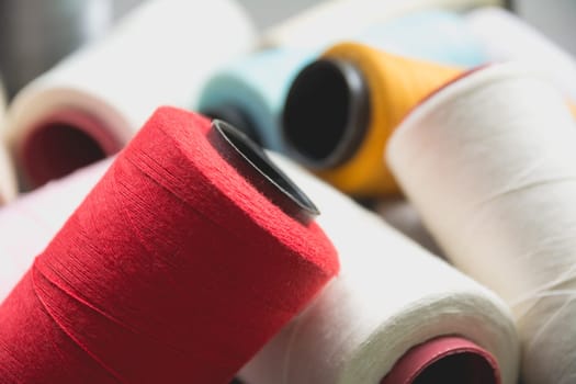Colorful sewing threads, Colored thread coils.