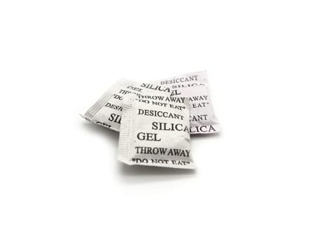 Silica gel packets isolated on a white background.